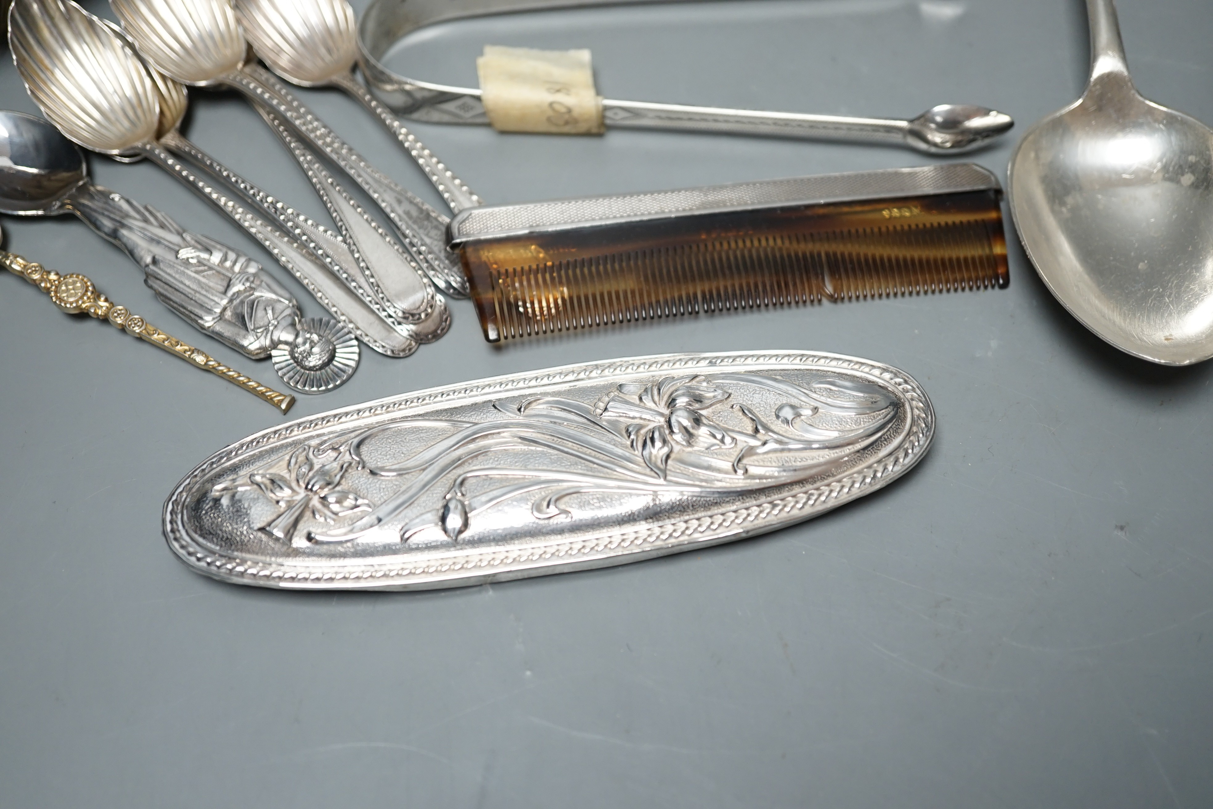 A small quantity of assorted silver flatware including a set of six teaspoons, by Peter, Ann & William Bateman, London, 1800, a pair of Victorian tablespoons, three pairs of silver sugar tongs etc. and a pewter spoon and
